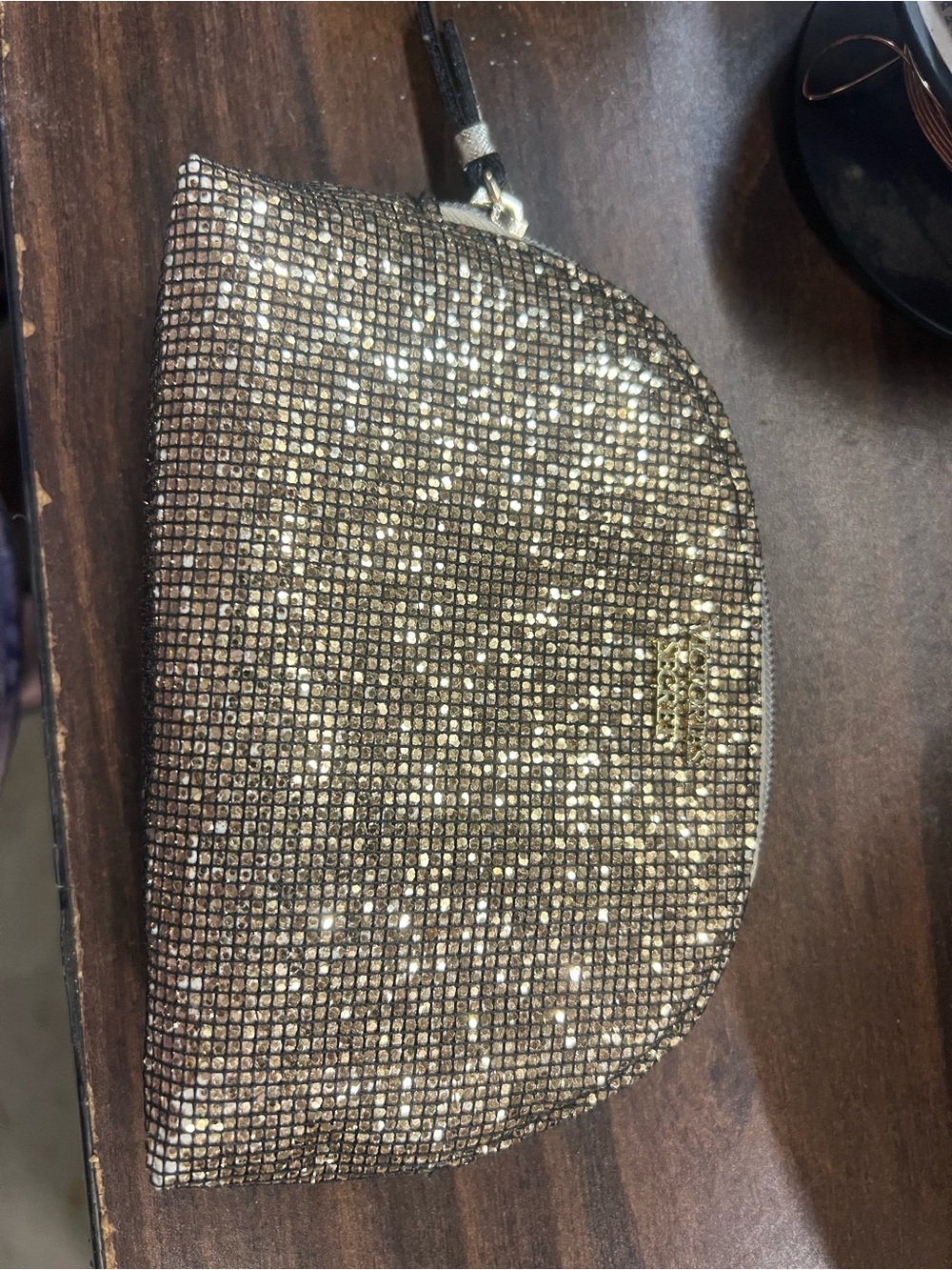 Victoria’s Secret gold sequence makeup bag